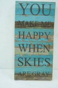 lot 283 image: Wooden Wall Decor. You Make Me Happy When Skies Are Grey 12x24x2