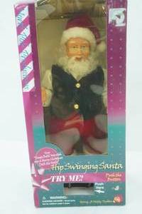 lot 391 image: Gemmy Hip Swinging Santa Doll. North Pole Productions
