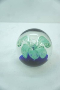 lot 428 image: Art Glass Globe Orb Paperweight wgreen flower and cobalt blue base