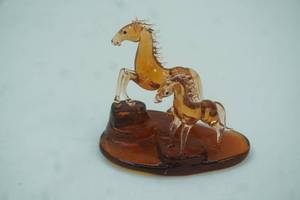 lot 441 image: Vintage Hand-Blown Amber Glass Horse & Foal Figurine Set