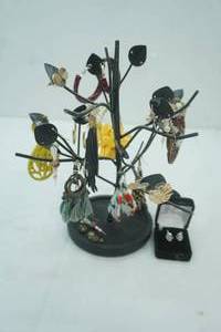 lot 459 image: Jewelry Tree Stand with a Variety of Earrings