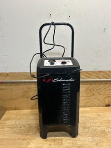 lot 8 image: Schumacher Wheeled Manual Battery ChargerEngine Starter MSRP $239.99 (untestedsold as is)