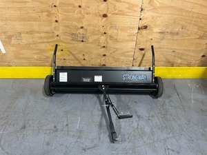 lot 76 image: Strongway Tow-Style Lawn Sweeper (sold as is)