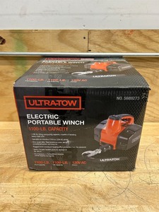 lot 136 image: Ultra-Tow Portable Electric Winch, Trailer Winch A380 Aluminum Housing Brushless Motor with 1100 Lbs Capacity, 120 Volt Winch Electric Winch (non working  sold as is)