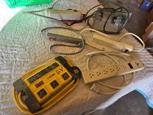 lot 16 image: Prime and Challenger Power Strips, APC SurgeArrest, and Work Light