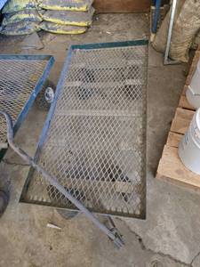lot 30 image: Metal Utility Cart with Wheels and Handle approximately 4 feet by 2 feet - May Need Tires
