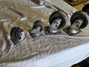 lot 143 image: Lot of 4 Caster Wheels with Various Sizes and Designs