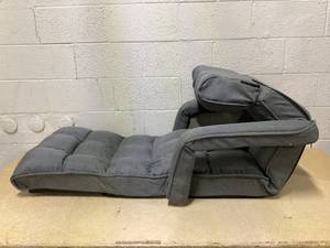 lot 25 image: Costway Slim 6-Position Adjustable Floor Chair with Adjustable Armrests and Footrest