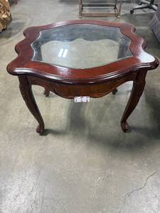 lot 3 image: Wood and Glass Accent Table with Carved Details