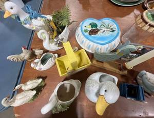 lot 12 image: Collection of Duck and Swan Figurines, Planters, and Decorative Items