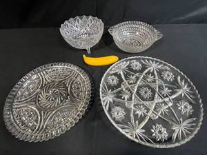 lot 17 image: Set of 4 Pressed Glass Serving Bowls and Platters with Star Cut Patterns & 1 Faux Banana