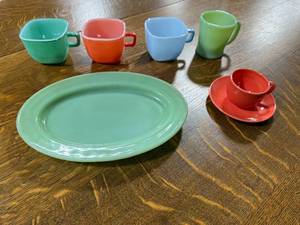lot 72 image: Vintage Mixed Color Milk Glass Dishware Set with Cups, Plate, and Saucer