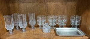 lot 107 image: Crystal Glassware Set with Stemmed Glasses, Dessert Bowls, Lidded Jar, and Metal Tray