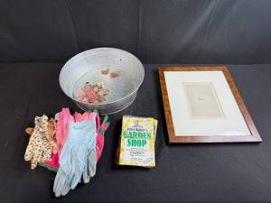 lot 111 image: Garden Tool Lot with Galvanized Tub, Assorted Gloves, Framed Egg Print, and Garden Booklet