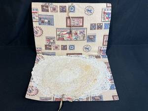 lot 139 image: Collection of Vintage Lace Doilies in Patterned Fabric Sleeve