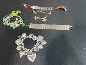 lot 171 image: Collection of Bracelets Including Silver Tone Charm, Gold Tone Pearl Charm, Beaded, and Braided Styles