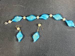 lot 175 image: Assorted Costume Jewelry Lot Bracelets, Earrings, and Charm Bracelet