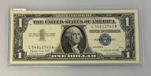 lot 105 image: 1957 A Series Blue Seal 1 Dollar Bill US Currency Silver Certificate (Great Condition) In Protective Sleeve