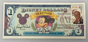 lot 114 image: VERY RARE 1993 Series DISNEY Dollars Mickeys 65th One Dollar Note With Walt Disney 6 Cent Stamp And Ink Postal Stamp Uncirculated (In Protective Sleeve)