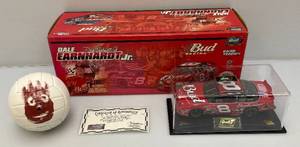 lot 122 image: 2001 Rivell DALE EARNHARDT JR.  Dover Win Raced Version 124 Scale Die Cast Car With Miniature Wilson Volleyball From The Movie Castaway  In Original Box