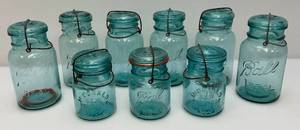 lot 211 image: Vintage Blue Glass Canning Jars With Glass Lids