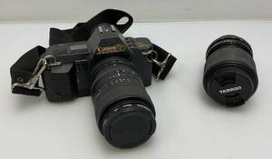 lot 230 image: Vintage Cannon T-70 Camera With Extra Lense