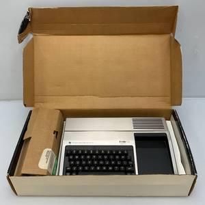lot 245 image: Vintage Texas Instruments Home Computer In Original Box