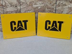 lot 26 image: CAT Yellow Metal Signs