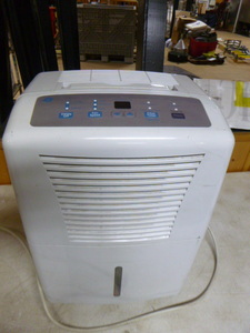 lot 15 image: GE Dehumidifier on Casters