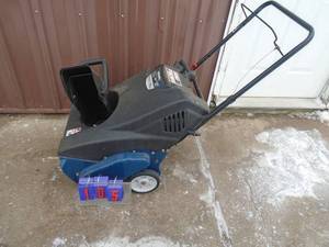 Yard Machine 21 snow thrower. Fires on ether but needs carb work. As shown.