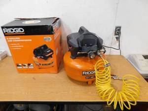 lot 47 image: RIDGID 6 Gal. 150 PSI Portable Electric Oil-Free Jobsite Pancake Air Compressor with Dual Pressure Gauges and 2-Quick Couplers