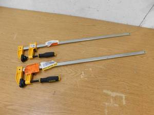 lot 93 image: (2) DEWALT 24 in. 600 lb. Bar Clamp w2.5 in. Throat Depth