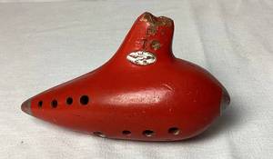 lot 41 image: Vintage Red Guido Bondi 10 Hole Sweet Potato Ocarina Flute Marked F