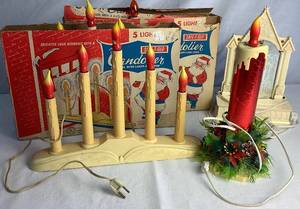 lot 57 image: Vintage Christmas Lighting with Safe-T-Glo Candoliers, Christmas Electric Candle  and Raylite Lighted Musical Cathedral
