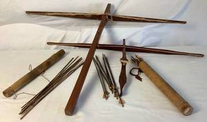lot 65 image: Vietnam Era Montagnard Tribe Archery  Hand Carved Crossbows and Arrows