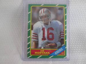 lot 159 image: 1986 Topps Joe Montana Card...