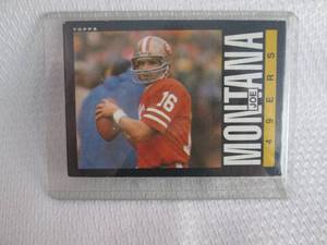lot 275 image: 1985 Topps Joe Montana Card...