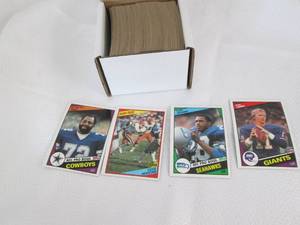 lot 364 image: Box Of 1984 Topps Football Cards...