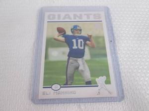 lot 493 image: 2012 Topps Eli Manning REPRINT Rook...
