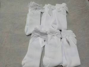 lot 76 image: 6 pair 4-6 yrs. Knee High Bow Socks...