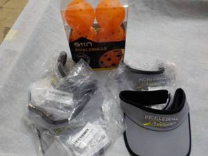 lot 121 image: 6 Pickle Balls and 4 Visors...