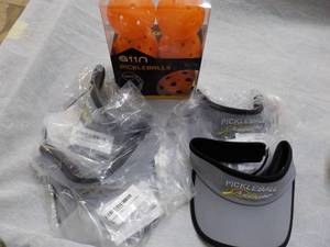 lot 122 image: 6 Pickle Balls and 4 Visors...