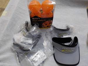lot 123 image: 6 Pickle Balls and 4 Visors...