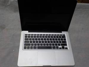 lot 201 image: Mac Book Pro...