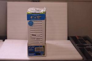 lot 28 image: White plastic floor registers