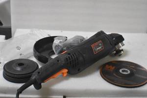 lot 65 image: WEN 94487 15-Amp 7-Inch Angle Grinder with Reversible Handle