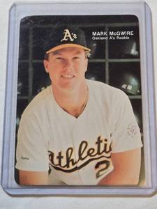 lot 22 image: Mark McGwire Rookie 1987 Mothers Cookies #1 - Oakland Athletics Baseball Card