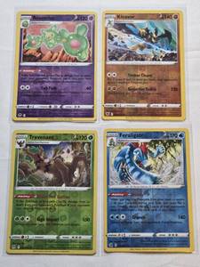 lot 50 image: Lot of 4 Pokemon Cards Holo Cards