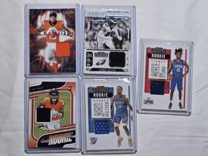 lot 80 image: Lot of 5 Relic Cards Featuring Troy Franklin, Johnny Wilson, Daniel Oturu, and Theo Maledon with Rookie Features
