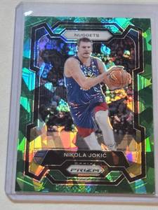 lot 99 image: Nikola Jokic 2023-24 Panini Prizm Green Cracked Ice #17 - Denver Nuggets Basketball Card